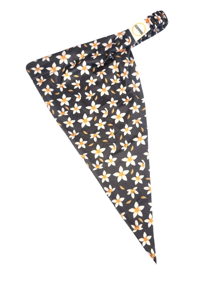 Flower Dreams pre-tied bandana showing the floral triangle and elastic band with Bandana Bliss tag