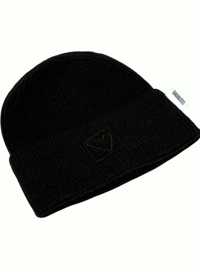 Black Sherpa Heart Beanie from the side, showing the cuff and heart patch